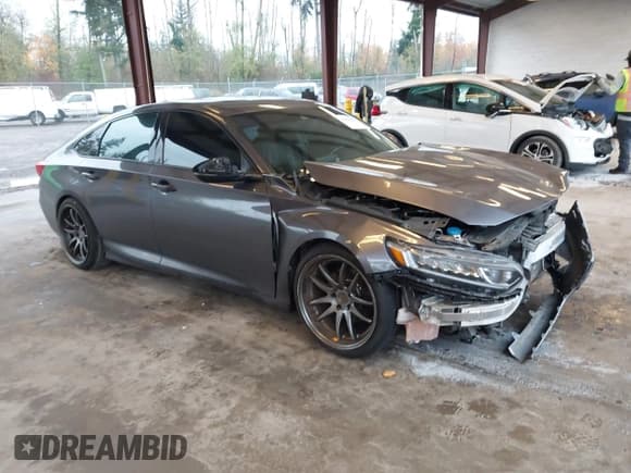 ✅ 2018 Honda Accord EX-L • VIN: 1HGCV2F65JA013975 • Lot: 43693832. Listed on IAAI with 94,752 mi. Free auction sales archive from the USA and detailed vehicle history report at DreamBid. Image 1.