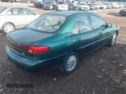 ✅ 1999 Ford Escort SE • VIN: 1FAFP13P2XW264113 • Lot: 42648045. Listed on IAAI with 72,253 mi. Free auction sales archive from the USA and detailed vehicle history report at DreamBid. Image 4.