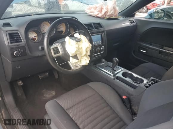 ✅ 2012 Dodge Challenger SXT Plus • VIN: 2C3CDYAG7CH100693 • Лот: 84772665. Опубликован ранее на Copart с пробегом 129 067 миль. Бесплатный доступ к архиву аукционных продаж из США и подробный отчёт об истории автомобиля на DreamBid. Изображение 8.