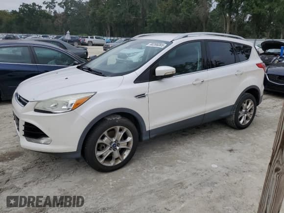✅ 2015 Ford Escape Titanium • VIN: 1FMCU0J92FUA87685 • Lot: 90396065. Wystawiony na Copart z przebiegiem 216 520 mil. Bezpłatny archiwum sprzedaży aukcyjnych z USA i szczegółowy raport historii pojazdu na DreamBid. Zdjęcie 1.