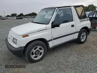 ✅ 1996 Chevrolet Tracker • VIN: 2CNBE1866T6918755 • Лот: 64882835. Опубликован ранее на Copart с пробегом 886 440 миль. Бесплатный доступ к архиву аукционных продаж из США и подробный отчёт об истории автомобиля на DreamBid. Изображение 1.