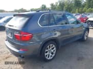✅ 2013 BMW X5 xDrive35i • VIN: 5UXZV4C5XD0B13128 • Lot: 43232453. Listed on IAAI with 142,298 mi. Free auction sales archive from the USA and detailed vehicle history report at DreamBid. Image 4.