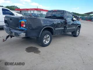 ✅ 2000 Toyota Tundra SR5 • VIN: 5TBKT4413YS045977 • Lot: 43096636. Listed on IAAI with 151,908 mi. Free auction sales archive from the USA and detailed vehicle history report at DreamBid. Image 4.