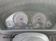 ✅ 2015 BMW M4 • VIN: WBS3R9C56FK335137 • Лот: 84062215. Опубликован ранее на Copart с пробегом 92 116 миль. Бесплатный доступ к архиву аукционных продаж из США и подробный отчёт об истории автомобиля на DreamBid. Изображение 9.