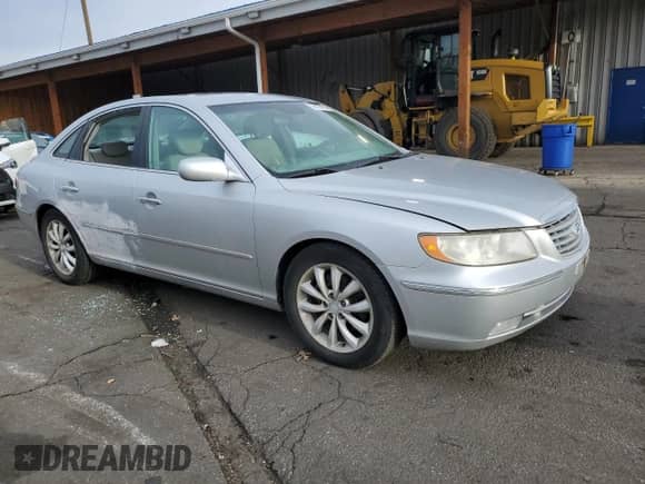 2006 Hyundai Azera SE z VIN KMHFC46F36A087430, wystawiony jako Copart lot #50927485 z przebiegiem 102 868 mil mil oraz Szkoda całkowita • Salvage title. Historia ofert i sprzedaży dostępna na DreamBid. Obrazek 4.