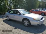 ✅ 2005 Ford Taurus SE • VIN: 1FAFP53U05A259841 • Lot: 57255835. Listed on Copart with 179,821 mi. Free auction sales archive from the USA and detailed vehicle history report at DreamBid. Image 4.