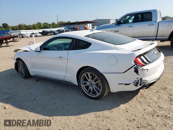 ✅ 2021 Ford Mustang EcoBoost • VIN: 1FA6P8TH0M5105142 • Lot: 84573175. Listed on Copart with 106,431 mi. Free auction sales archive from the USA and detailed vehicle history report at DreamBid. Image 2.