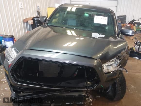✅ 2022 Toyota Tacoma SR • VIN: 3TMCZ5AN7NM533090 • Lot: 43813384. Listed on IAAI with 30,624 mi. Free auction sales archive from the USA and detailed vehicle history report at DreamBid. Image 12.