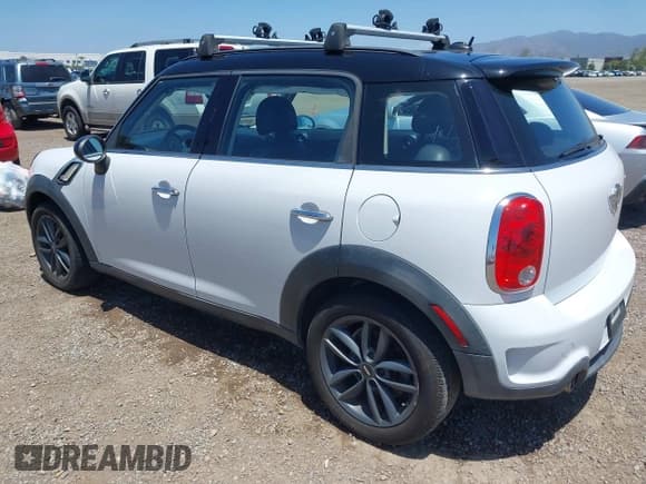 ✅ 2014 MINI Countryman S • VIN: WMWZC3C56EWP52407 • Lot: 42255716. Listed on IAAI with 74,943 mi. Free auction sales archive from the USA and detailed vehicle history report at DreamBid. Image 3.