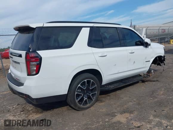 2023 Chevrolet Tahoe RST with VIN 1GNSKRKD2PR410464, listed as a IAAI auction lot 43336461 with 31,732 mi miles and . Bid and sale history available at DreamBid. Image 4.