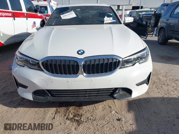 ✅ 2022 BMW 3 Series 330i • VIN: 3MW5R1J01N8C72194 • Lot: 41833596. Listed on IAAI with 24,296 mi. Free auction sales archive from the USA and detailed vehicle history report at DreamBid. Image 12.