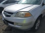 ✅ 2005 Acura MDX Touring • VIN: 2HNYD18855H521669 • Lot: 42571823. Listed on IAAI with 326,146 mi. Free auction sales archive from the USA and detailed vehicle history report at DreamBid. Image 12.