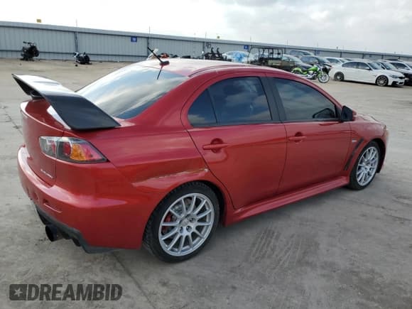 ✅ 2015 Mitsubishi Lancer Evolution GSR • VIN: JA32W8FV5FU014212 • Лот: 44785485. Опубликован ранее на Copart с пробегом 81 856 миль. Бесплатный доступ к архиву аукционных продаж из США и подробный отчёт об истории автомобиля на DreamBid. Изображение 3.