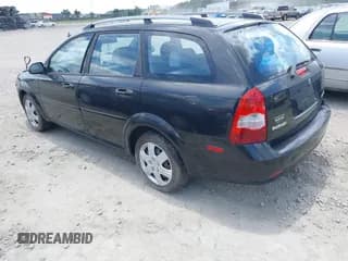 ✅ 2007 Suzuki Forenza • VIN: KL5JD86Z97K667621 • Lot: 42611083. Wystawiony na IAAI z przebiegiem 111 284 mil. Bezpłatny archiwum sprzedaży aukcyjnych z USA i szczegółowy raport historii pojazdu na DreamBid. Zdjęcie 3.
