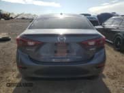 ✅ 2014 Mazda 3 S Touring • VIN: JM1BM1V33E1173390 • Lot: 70202315. Wystawiony na Copart z przebiegiem 127 711 mil. Bezpłatny archiwum sprzedaży aukcyjnych z USA i szczegółowy raport historii pojazdu na DreamBid. Zdjęcie 6.