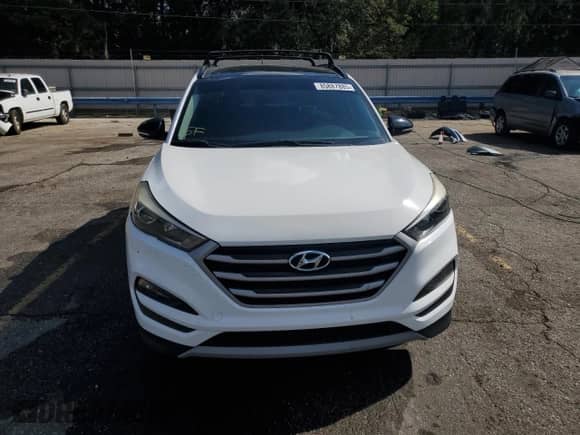 2017 Hyundai Tucson Sport z VIN KM8J33A24HU557040, wystawiony jako Copart lot #85887885 z przebiegiem 113 488 mil mil oraz Szkoda całkowita • Salvage title. Historia ofert i sprzedaży dostępna na DreamBid. Obrazek 5.