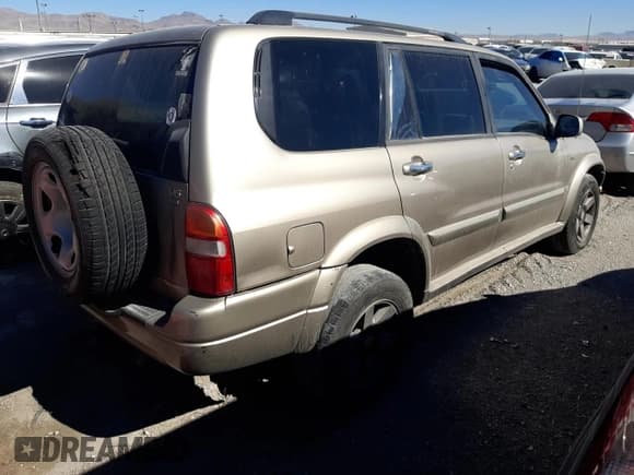 ✅ 2003 Suzuki XL7 Touring • VIN: JS3TX92V334106849 • Лот: 87515725. Опубликован ранее на Copart с пробегом 197 064 миль. Бесплатный доступ к архиву аукционных продаж из США и подробный отчёт об истории автомобиля на DreamBid. Изображение 3.