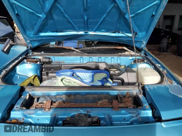 ✅ 1986 Toyota MR2 • VIN: JT2AW15C1G0090547 • Лот: 85304405. Опубликован ранее на Copart с пробегом 174 731 миль. Бесплатный доступ к архиву аукционных продаж из США и подробный отчёт об истории автомобиля на DreamBid. Изображение 11.