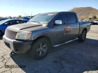 ✅ 2005 Nissan Titan LE • VIN: 1N6AA07AX5N537532 • Lot: 85414795. Listed on Copart with 302,094 mi. Free auction sales archive from the USA and detailed vehicle history report at DreamBid. Image 1.