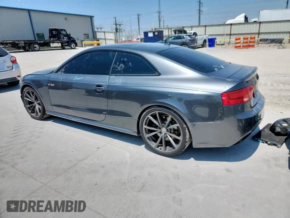 ✅ 2015 Audi RS 5 • VIN: WUAC6AFR6FA901662 • Lot: 67585365. Listed on Copart with 69,061 mi. Free auction sales archive from the USA and detailed vehicle history report at DreamBid. Image 2.