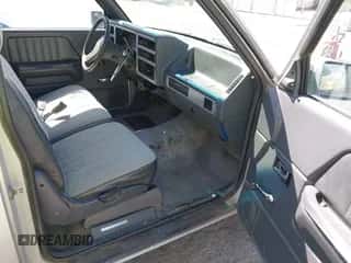 1990 Dodge Dakota z VIN 1B7GL23X0LS642396, wystawiony jako IAAI lot #42359220 z przebiegiem 177 562 mil mil oraz . Historia ofert i sprzedaży dostępna na DreamBid. Obrazek 5.