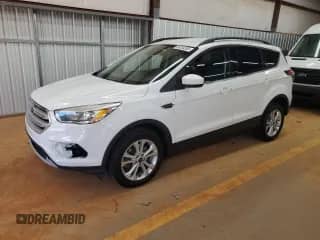 2018 Ford Escape SE с VIN 1FMCU9GD5JUB16914, выставлен на аукционе Copart как лот 85204205 с пробегом 152 391 миль миль и Чистый • Clean title. История ставок и продаж доступна на DreamBid. Изображение 1.