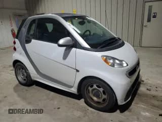 ✅ 2015 Smart fortwo Passion • VIN: WMEEJ3BA5FK814542 • Lot: 72978714. Wystawiony na Copart z przebiegiem 60 081 mil. Bezpłatny archiwum sprzedaży aukcyjnych z USA i szczegółowy raport historii pojazdu na DreamBid. Zdjęcie 4.