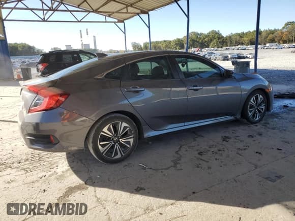 ✅ 2016 Honda Civic EX-T • VIN: 19XFC1F31GE039237 • Лот: 82703325. Опубликован ранее на Copart с пробегом 77 181 миль. Бесплатный доступ к архиву аукционных продаж из США и подробный отчёт об истории автомобиля на DreamBid. Изображение 3.