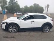✅ 2022 Mazda CX-30 S Select • VIN: 3MVDMBBL6NM427582 • Lot: 43541110. Wystawiony na IAAI z przebiegiem 33 599 mil. Bezpłatny archiwum sprzedaży aukcyjnych z USA i szczegółowy raport historii pojazdu na DreamBid. Zdjęcie 14.
