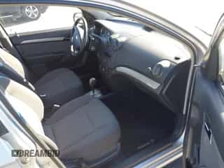 2007 Chevrolet Aveo LS z VIN KL1TD56657B150282, wystawiony jako IAAI lot #41416393 z przebiegiem 74 809 mil mil oraz . Historia ofert i sprzedaży dostępna na DreamBid. Obrazek 5.