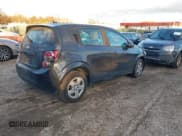 ✅ 2014 Chevrolet Sonic LS • VIN: 1G1JA6SG5E4158552 • Lot: 43924683. Listed on IAAI with 99,432 mi. Free auction sales archive from the USA and detailed vehicle history report at DreamBid. Image 4.