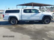 ✅ 2018 Toyota Tacoma SR5 • VIN: 3TMDZ5BN4JM043588 • Lot: 41555245. Listed on IAAI with 143,873 mi. Free auction sales archive from the USA and detailed vehicle history report at DreamBid. Image 14.