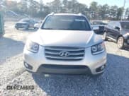 ✅ 2012 Hyundai Santa Fe SE • VIN: 5XYZHDAG2CG145428 • Lot: 81672604. Listed on Copart with 89,987 mi. Free auction sales archive from the USA and detailed vehicle history report at DreamBid. Image 5.