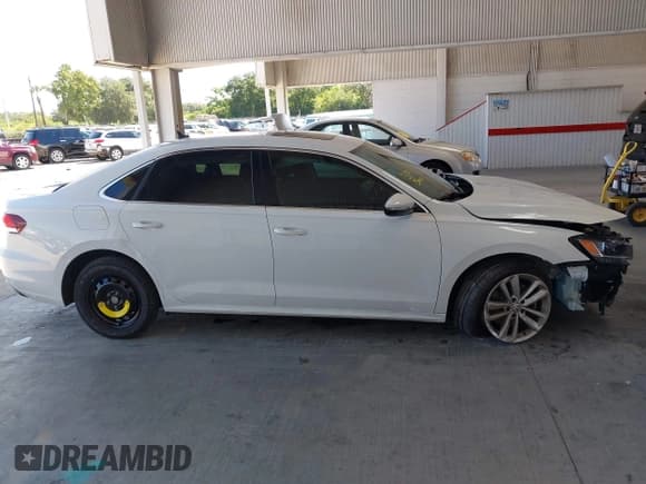 ✅ 2020 Volkswagen Passat SE • VIN: 1VWWA7A34LC013083 • Лот: 42925230. Опубликован ранее на IAAI с пробегом 68 683 миль. Бесплатный доступ к архиву аукционных продаж из США и подробный отчёт об истории автомобиля на DreamBid. Изображение 14.