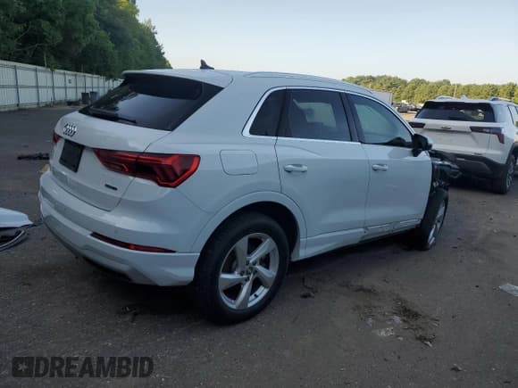 ✅ 2019 Audi Q3 Premium • VIN: WA1AECF35K1079696 • Лот: 64794915. Опубликован ранее на Copart с пробегом 74 121 миль. Бесплатный доступ к архиву аукционных продаж из США и подробный отчёт об истории автомобиля на DreamBid. Изображение 3.