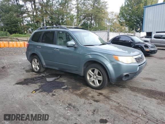 ✅ 2009 Subaru Forester X • VIN: JF2SH63629G784935 • Lot: 82395785. Listed on Copart with 212,935 mi. Free auction sales archive from the USA and detailed vehicle history report at DreamBid. Image 4.