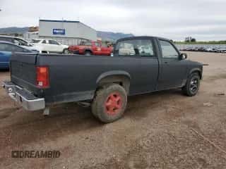 1991 Dodge Dakota SLT z VIN 1B7FL26X2MS342836, wystawiony jako Copart lot #58154275 z przebiegiem 153 466 mil mil oraz Nie do naprawy • Non repairable. Historia ofert i sprzedaży dostępna na DreamBid. Obrazek 3.