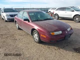 ✅ 2002 Saturn SL • VIN: 1G8ZF52822Z165725 • Lot: 43860858. Listed on IAAI with 191,469 mi. Free auction sales archive from the USA and detailed vehicle history report at DreamBid. Image 1.