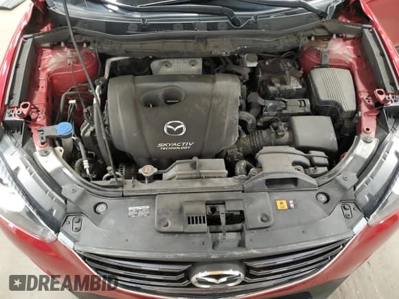 ✅ 2016 Mazda CX-5 Touring • VIN: JM3KE4CY7G0898598 • Lot: 56717895. Listed on Copart with 103,548 mi. Free auction sales archive from the USA and detailed vehicle history report at DreamBid. Image 12.