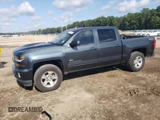 2017 Chevrolet Silverado 1500 LT with VIN 3GCUKREC6HG327464, listed as a Copart auction lot 68323465 with 152,852 mi miles and Salvage title. Bid and sale history available at DreamBid. Image 1.