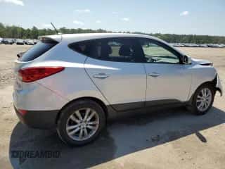 2013 Hyundai Tucson Limited z VIN KM8JUCAC9DU557664, wystawiony jako Copart lot #53707934 z przebiegiem 148 967 mil mil oraz Szkoda całkowita • Salvage title. Historia ofert i sprzedaży dostępna na DreamBid. Obrazek 3.