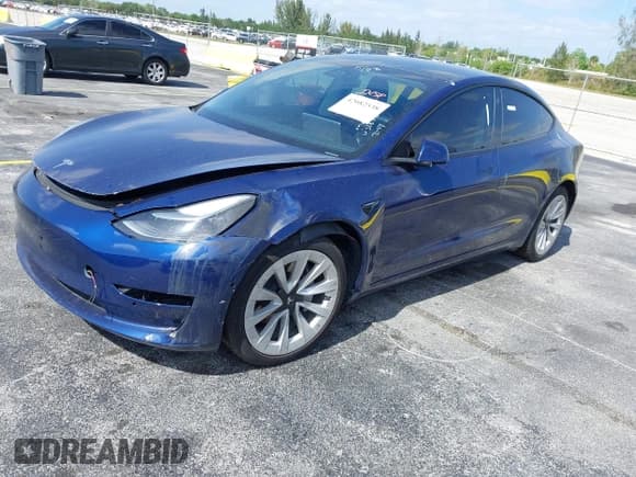 ✅ 2021 Tesla Model 3 Standard Range Plus • VIN: 5YJ3E1EA5MF031872 • Lot: 42082538. Wystawiony na IAAI z przebiegiem 59 809 mil. Bezpłatny archiwum sprzedaży aukcyjnych z USA i szczegółowy raport historii pojazdu na DreamBid. Zdjęcie 2.