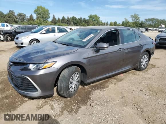 2023 Toyota Camry Hybrid LE with VIN 4T1C31AK8PU059323, listed as a Copart auction lot 72040395 with 31,361 mi miles and Salvage title. Bid and sale history available at DreamBid. Image 1.