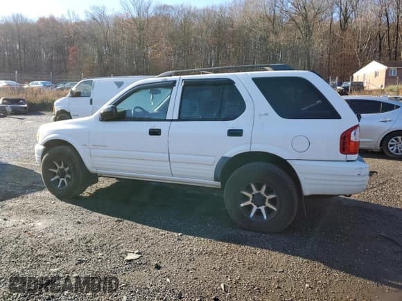 ✅ 2001 Isuzu Rodeo S • VIN: 4S2CK58W414338481 • Lot: 80849314. Listed on Copart with 109,036 mi. Free auction sales archive from the USA and detailed vehicle history report at DreamBid. Image 2.