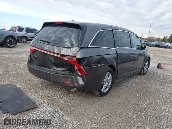 ✅ 2012 Honda Odyssey Touring • VIN: 5FNRL5H92CB083290 • Lot: 43664749. Listed on IAAI with 315,361 mi. Free auction sales archive from the USA and detailed vehicle history report at DreamBid. Image 4.