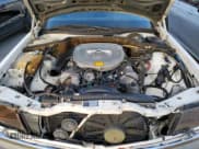 ✅ 1984 Mercedes-Benz 500 • VIN: WDB1260441A061720 • Лот: 93342945. Опубликован ранее на Copart с пробегом 117 508 миль. Бесплатный доступ к архиву аукционных продаж из США и подробный отчёт об истории автомобиля на DreamBid. Изображение 11.