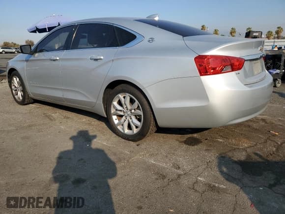 ✅ 2018 Chevrolet Impala LT • VIN: 2G1105S37J9100590 • Лот: 71194434. Опубликован ранее на Copart с пробегом 70 503 миль. Бесплатный доступ к архиву аукционных продаж из США и подробный отчёт об истории автомобиля на DreamBid. Изображение 2.