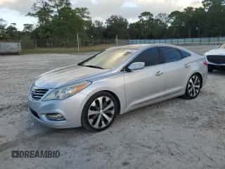 2013 Hyundai Azera z VIN KMHFH4JG2DA284166, wystawiony jako Copart lot #78656664 z przebiegiem 157 197 mil mil oraz Czysty tytuł • Clean title. Historia ofert i sprzedaży dostępna na DreamBid. Obrazek 1.