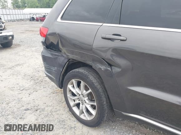 ✅ 2015 Jeep Grand Cherokee Summit • VIN: 1C4RJEJG2FC816289 • Lot: 41964032. Listed on IAAI with 106,000 mi. Free auction sales archive from the USA and detailed vehicle history report at DreamBid. Image 6.