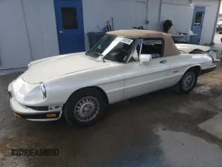 ✅ 1989 Alfa Romeo Spider Graduate • VIN: ZARBA5648K6000119 • Lot: 83945315. Wystawiony na Copart z przebiegiem 98 374 mil. Bezpłatny archiwum sprzedaży aukcyjnych z USA i szczegółowy raport historii pojazdu na DreamBid. Zdjęcie 1.